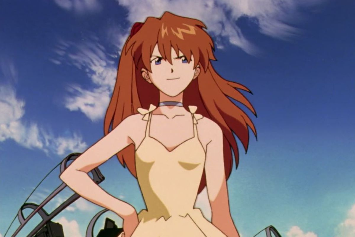 Asuka in her yellow sundress, hands on hips, at her Episode #8 debut